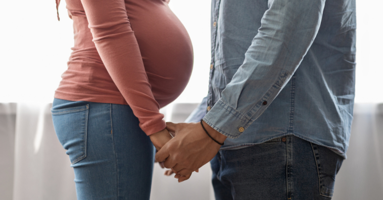 Husband having tough conversation with pregnant wife