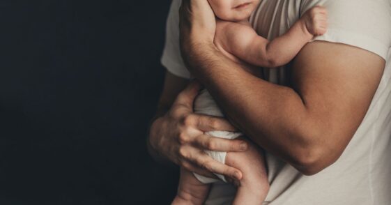 Dad holding baby