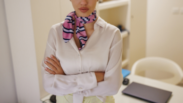 Woman wearing a scarf in the workplace