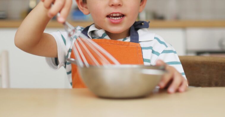 Little boy playing chef