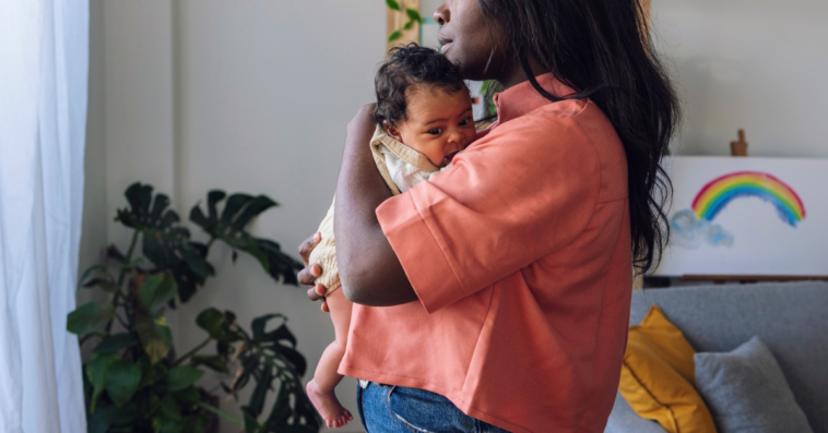 woman holding baby