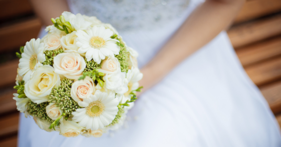 close-up of bride holding bouquet