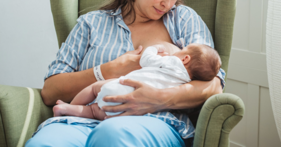 woman breastfeeding infant