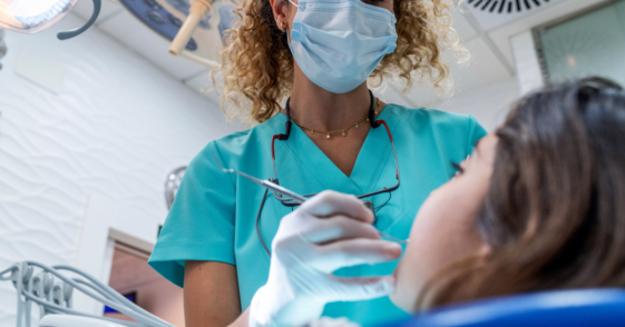 Female dentist with patient