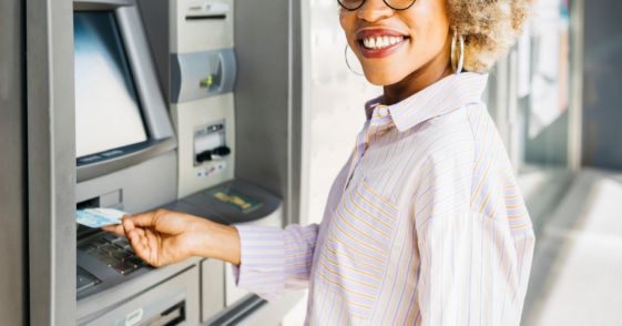 Woman withdrawing money at ATM