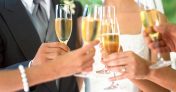 Bride and groom sharing a toast