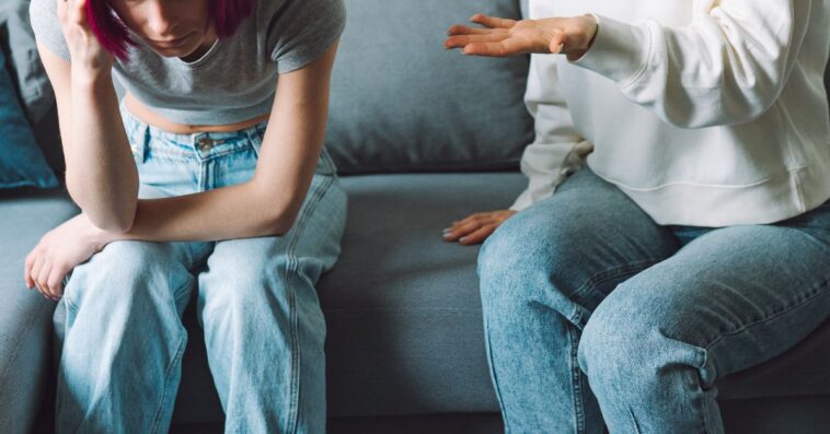 Mother scolding teen daughter