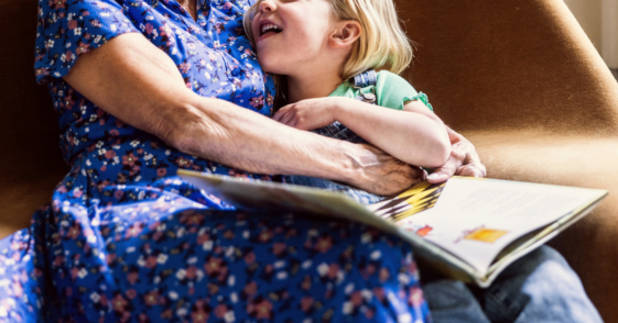 grandmother reading to grandchild