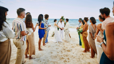 wedding taking place on a tropical beach