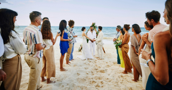 wedding taking place on a tropical beach