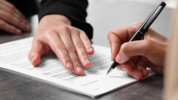 person signing legal document