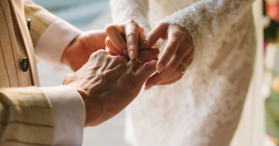 Couple exchanging rings