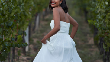 Woman in white gown at someone else's wedding