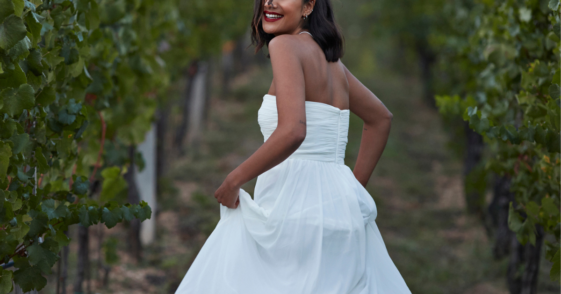 Woman in white gown at someone else's wedding