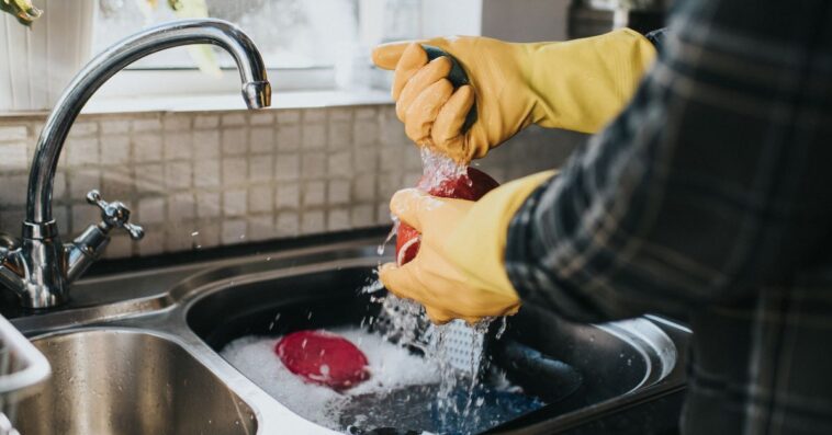 Person washing dishes