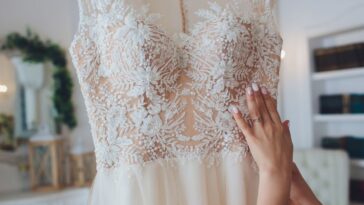 Woman adjusting wedding dress