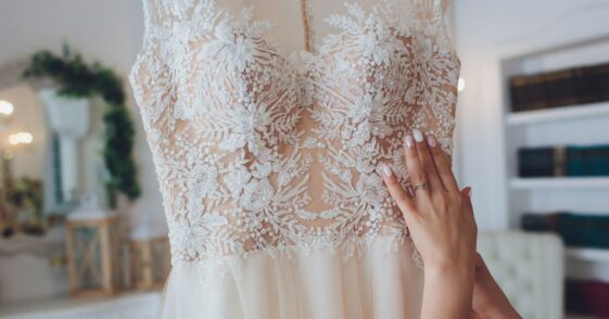 Woman adjusting wedding dress