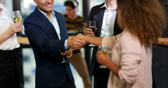 Man and woman flirting at an office party