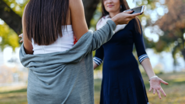 two sisters disagreeing with each other