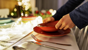 person setting the table