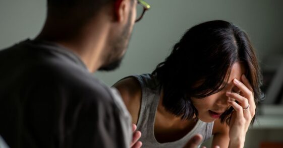 Young married couple after a fight. Angry couple ignoring each other, relationship troubles.