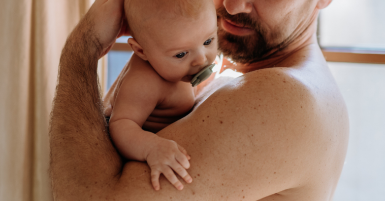 Dad with newborn baby