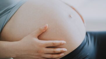 Close-up of a pregnant woman's belly.