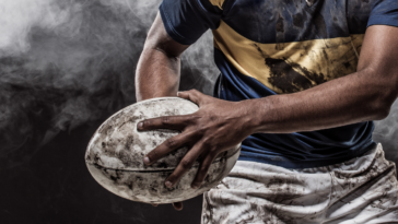 A man playing rugby