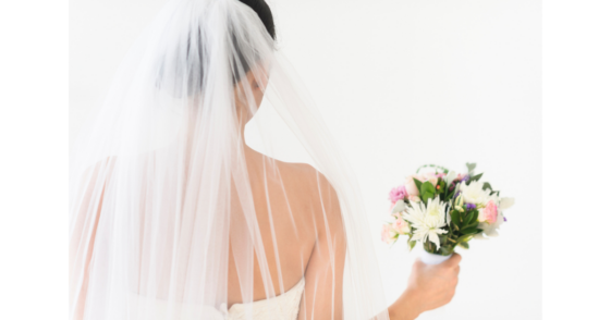 Upset bride holding her bouquet