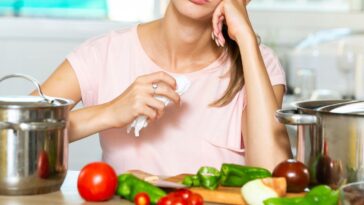 Woman frustrated while cooking