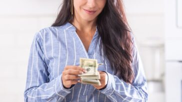 Woman counting cash