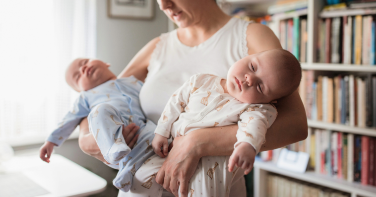 woman holding twins