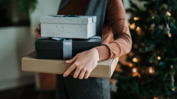 Person holding presents