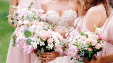 Bridesmaid's bouquets, wedding bouquets closeup. Stylish summer wedding.