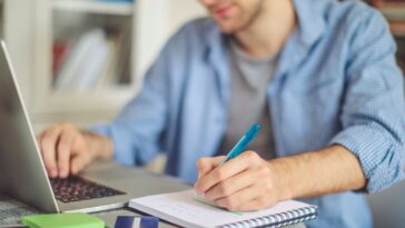 Man working on laptop at home