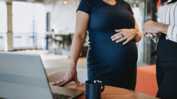 Pregnant coworker at office