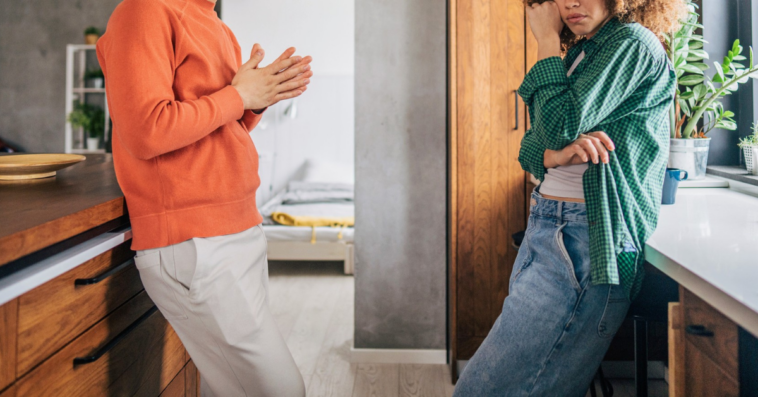 couple arguing in kitchen