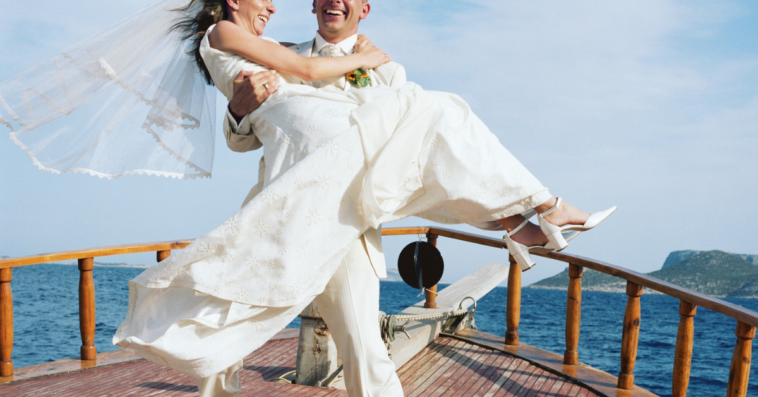 bride and groom on deck of ship