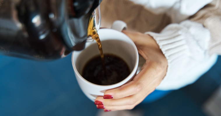 Person making coffee at home