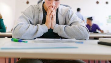 Young student preparing to take exam