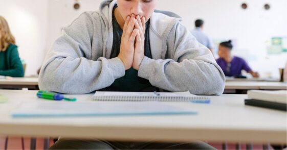 Young student preparing to take exam