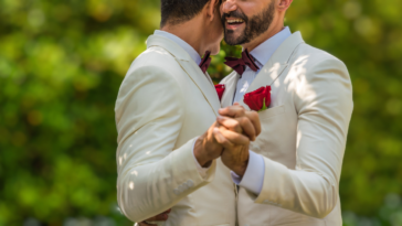 grooms dance at their wedding