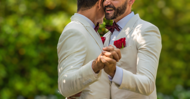 grooms dance at their wedding