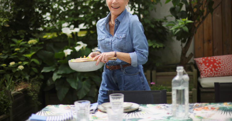 woman setting outdoor table