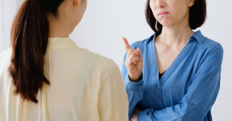 older woman arguing with younger woman