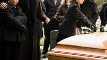 children at a graveside funeral