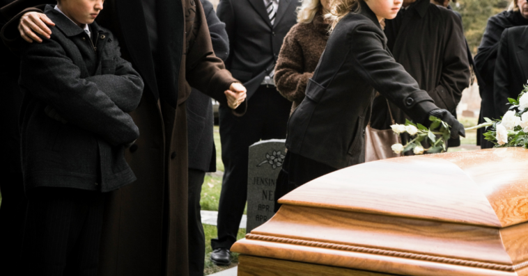 children at a graveside funeral