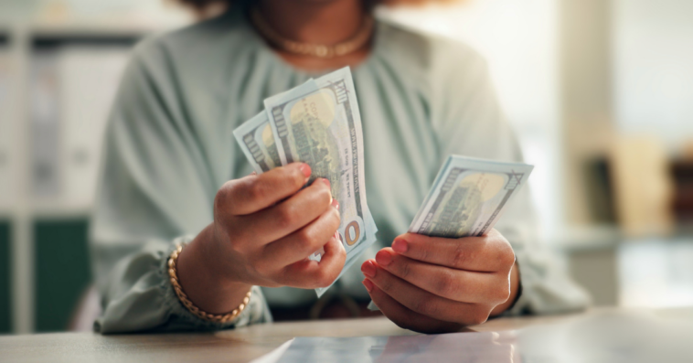 woman counting money