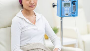 Young woman receiving chemotherapy