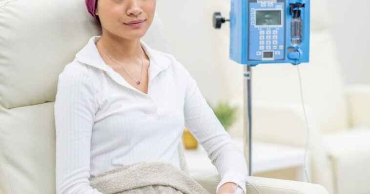 Young woman receiving chemotherapy